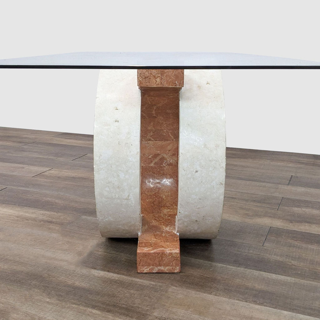 Close-up of Reperch dining table leg, demonstrating the hand-cut fossil stone design over plywood.