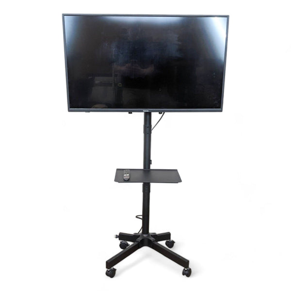 Toshiba Fire TV on a mobile stand with locking wheels for easy movement and stable setup.  