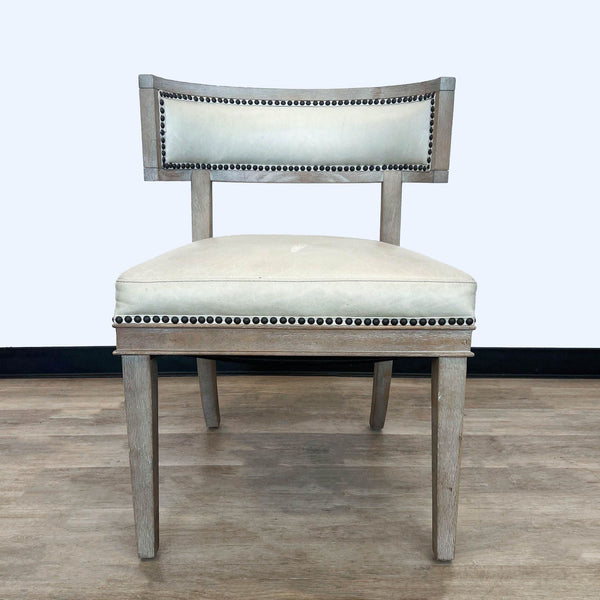 HD Buttercup Carter accent chair with curved back and nailhead trim, on a wood floor.