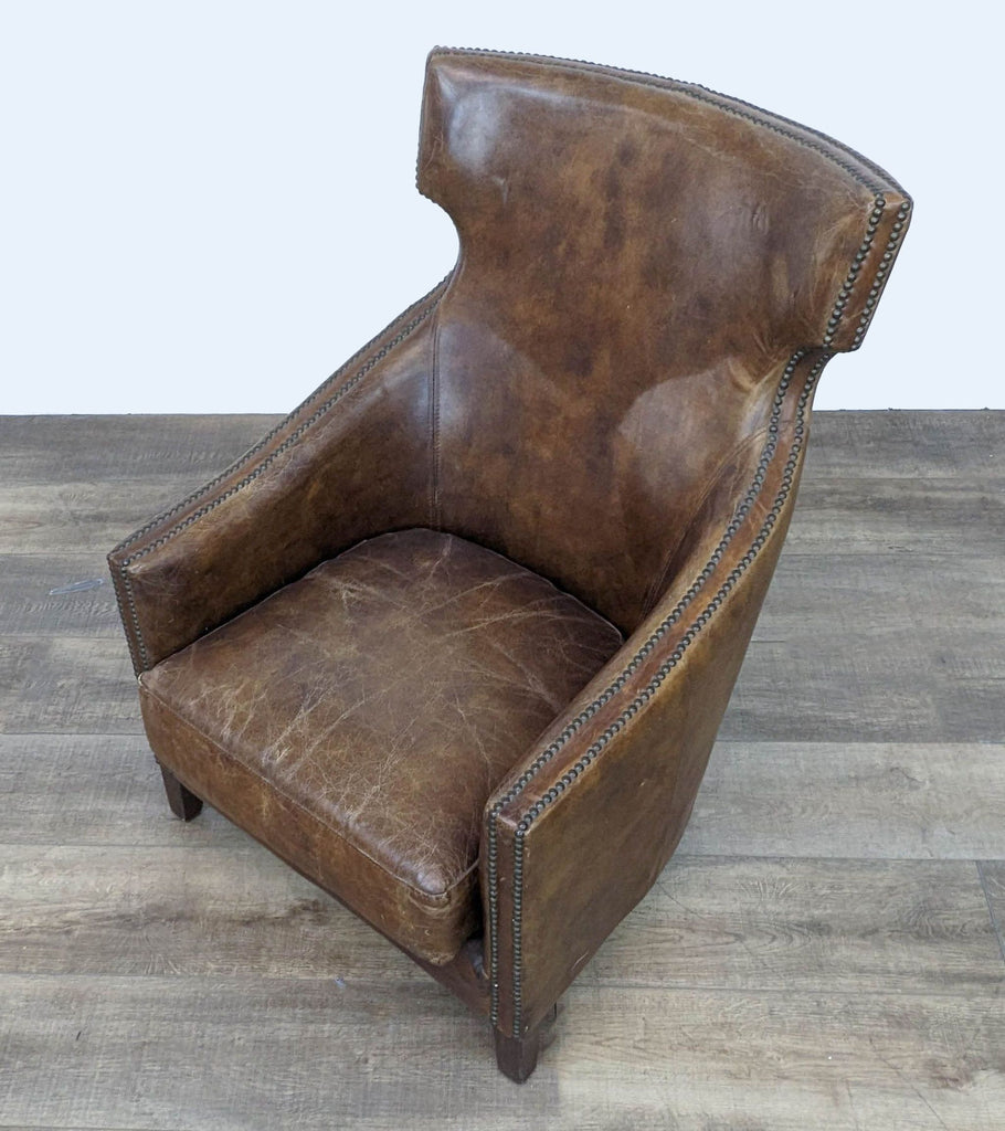 Four Hands Distressed Leather Accent Chair with Nailhead Trim