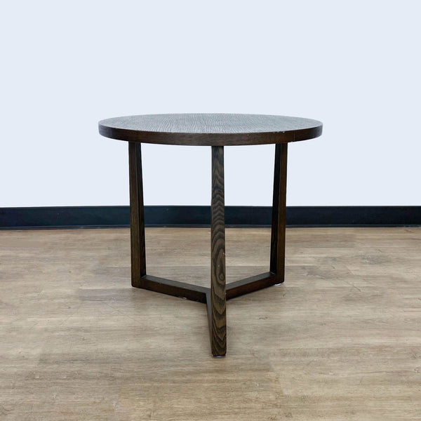 Reperch brand end table with round dark wood top and three-legged base, neutral background.
