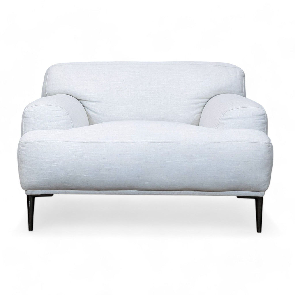Abisko chair by Article in Quartz White, with plush fiber-mix filling and sleek titanium legs.