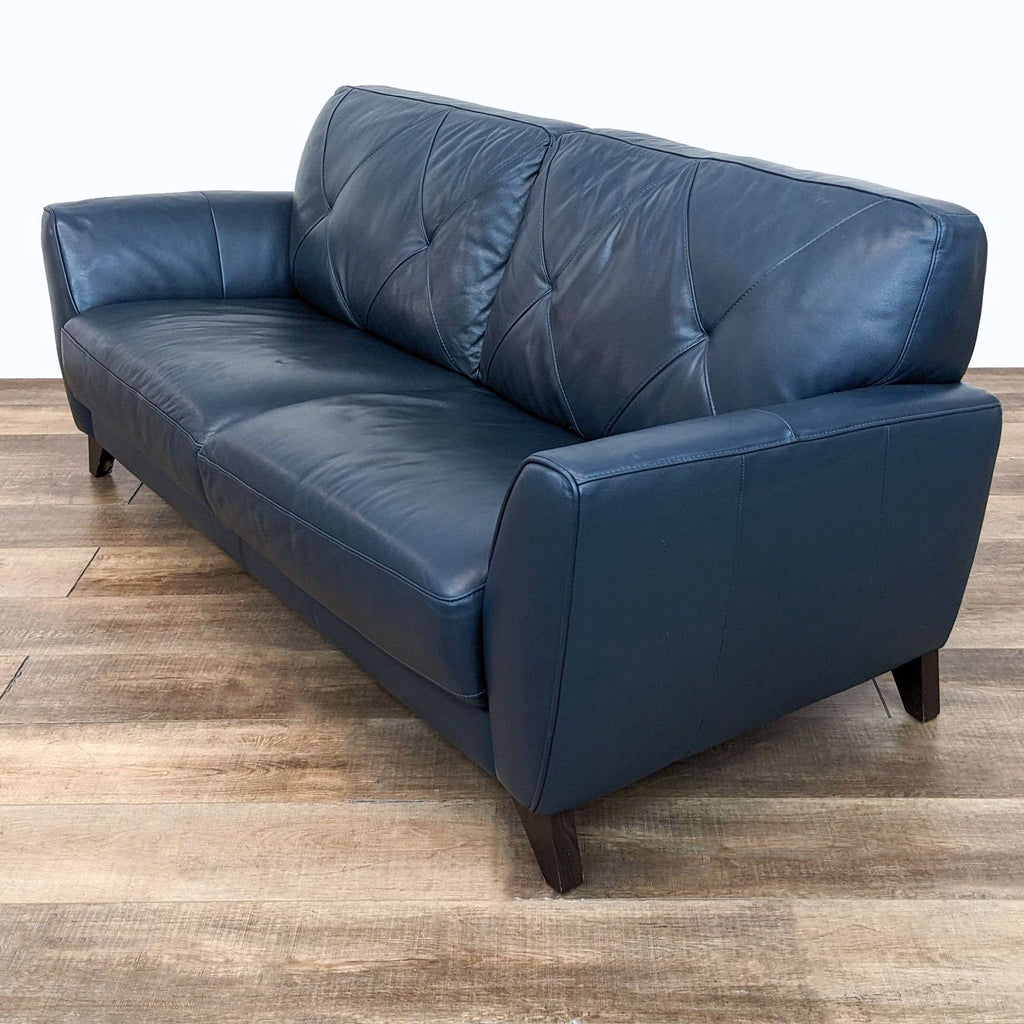 Macy’s Myia Tufted Back Leather Sofa in Peacock Blue