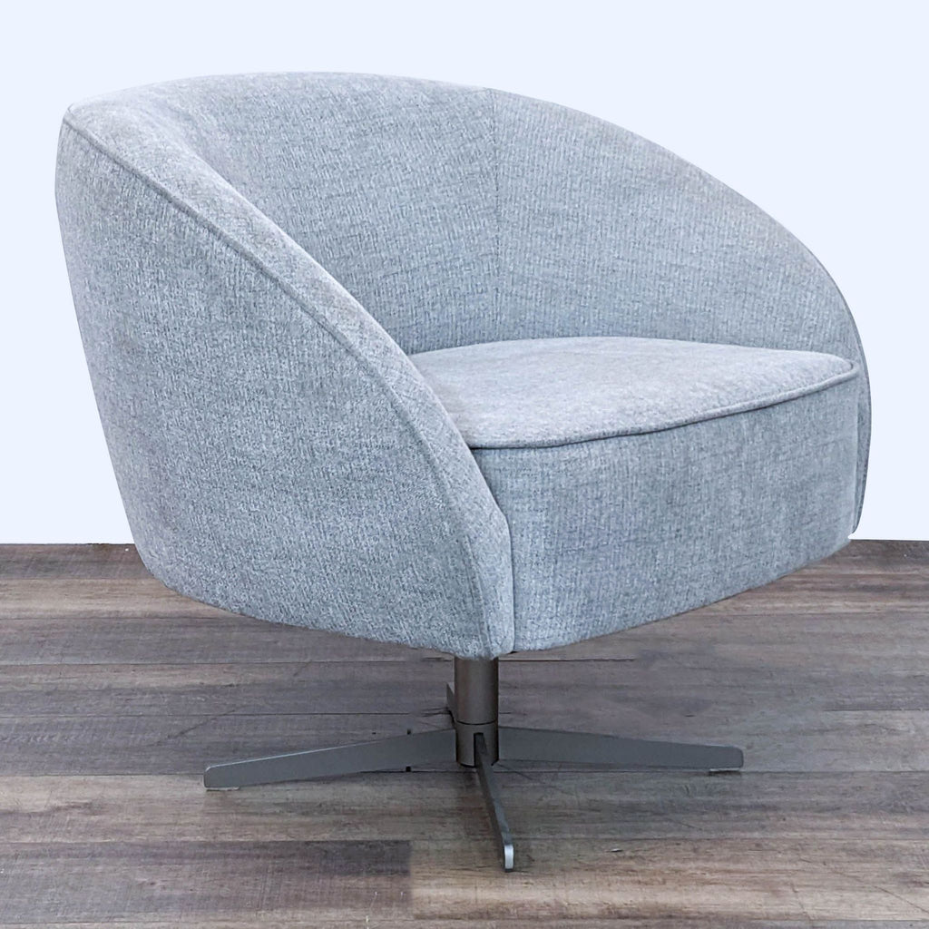 2. Lounge chair featuring curved back and sloped arms, with a four-star swivel base, in a pebble hue from Four Hands.