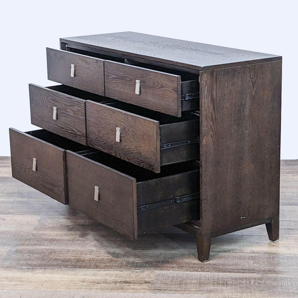 Six-drawer Niche dresser by West Elm, drawers open on metal glides.