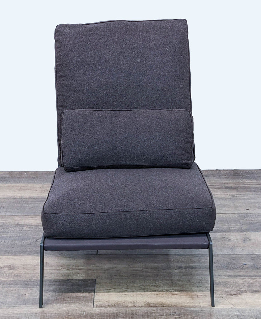 3. Camerich Arc Lounge Chair displaying its feather down back cushion and seat, black frame visible, front angled view.