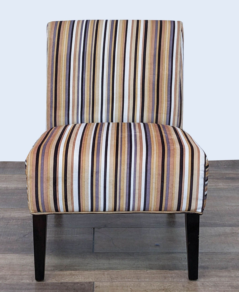 Reperch striped slipper chair with large back, padded seat, welting details on brown wooden legs.