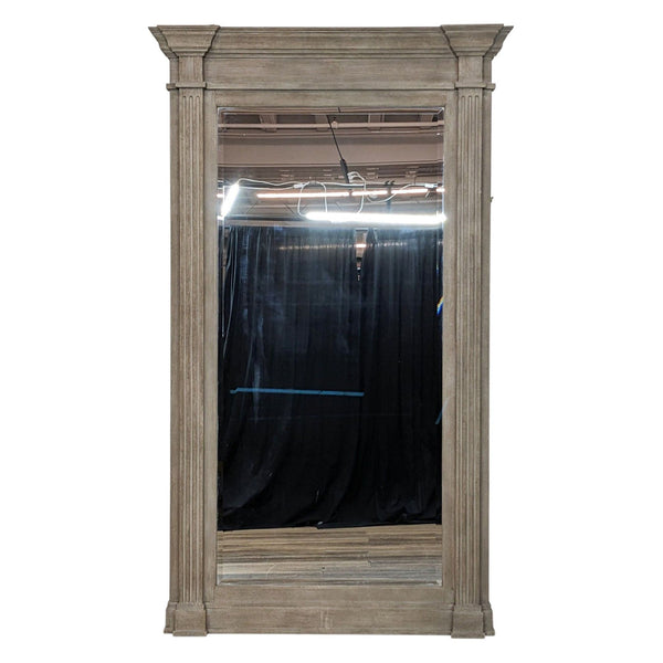 Pottery Barn's Livingston full-length mirror with a beveled edge and architectural weathered frame.