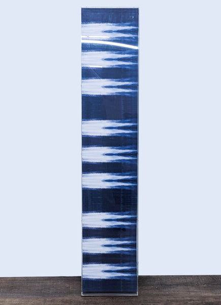 1. Abstract vertical painting featuring streaks of white on a deep blue background presented by Benson-Cobb Gallery.
