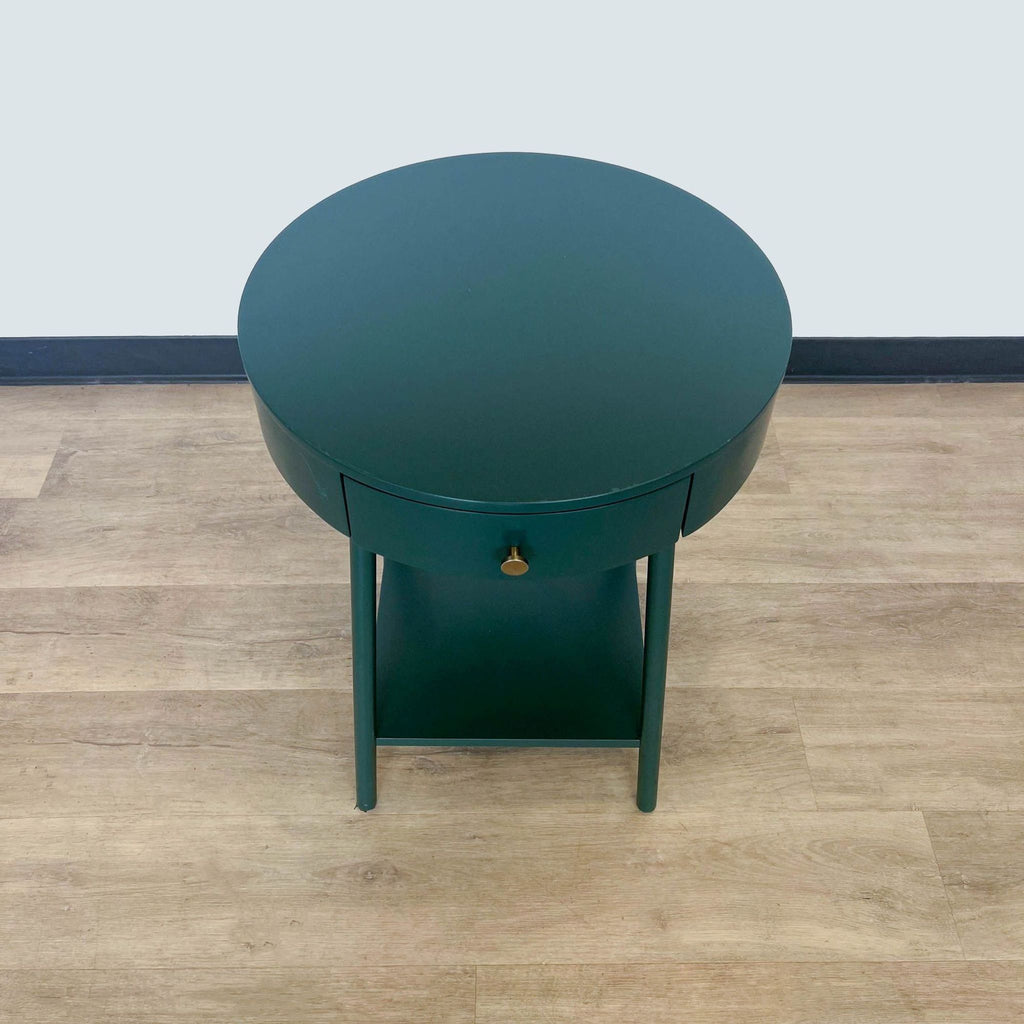 Alt text 3: Top view of a circular Reperch end table in teal, featuring a sleek finish with a visible drawer and knob.