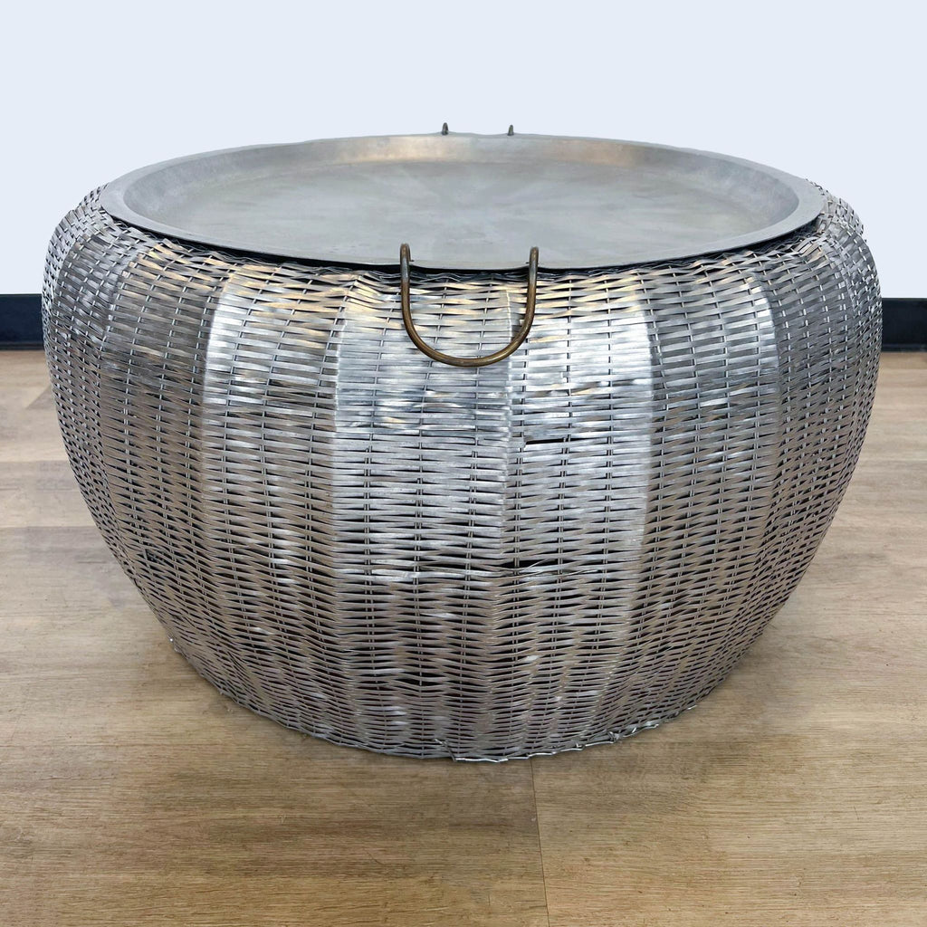 2. Silver Basket Weave metal coffee table by Reperch featuring a detachable tray top with ring handles, set against a plain backdrop.