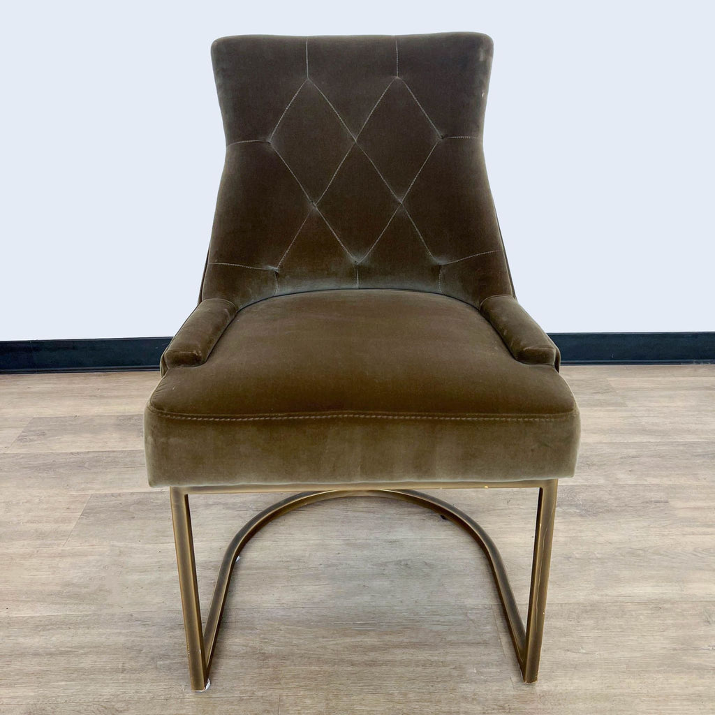 1. Velvet upholstered Rupert dining chair with tufted back and gold metal base by Sonder Living, viewed from the front angle.