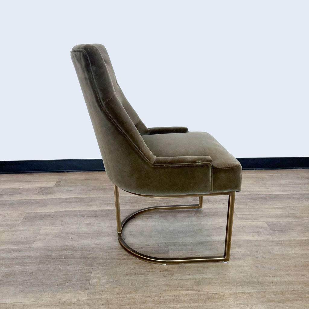 2. Side view of a Sonder Living Rupert dining chair featuring plush velvet upholstery with a sleek metal base and curved backrest.