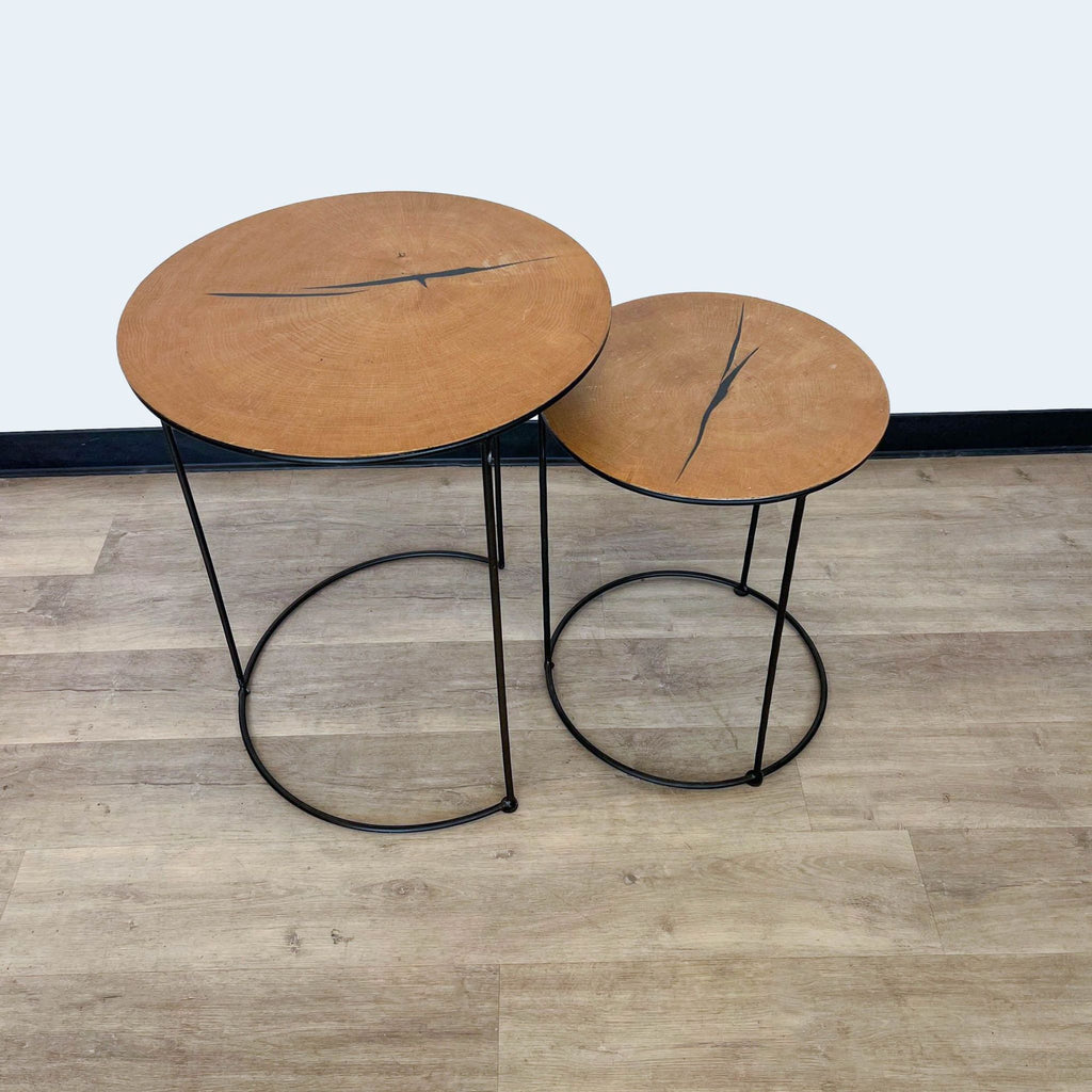 a pair of round table and stools