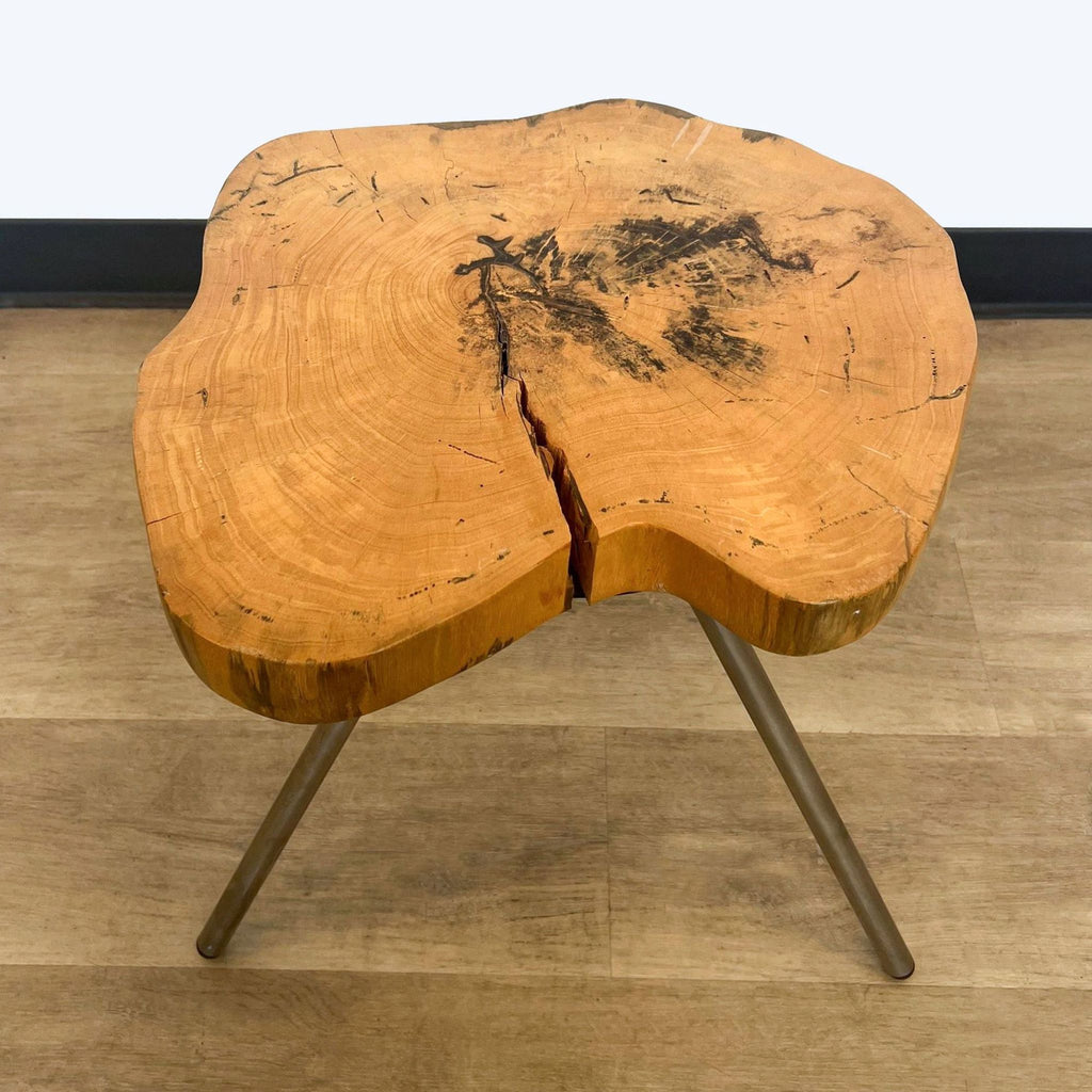Natural wood slab table with sleek metal base.