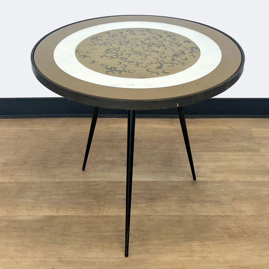 a round table with a circular design in the middle.