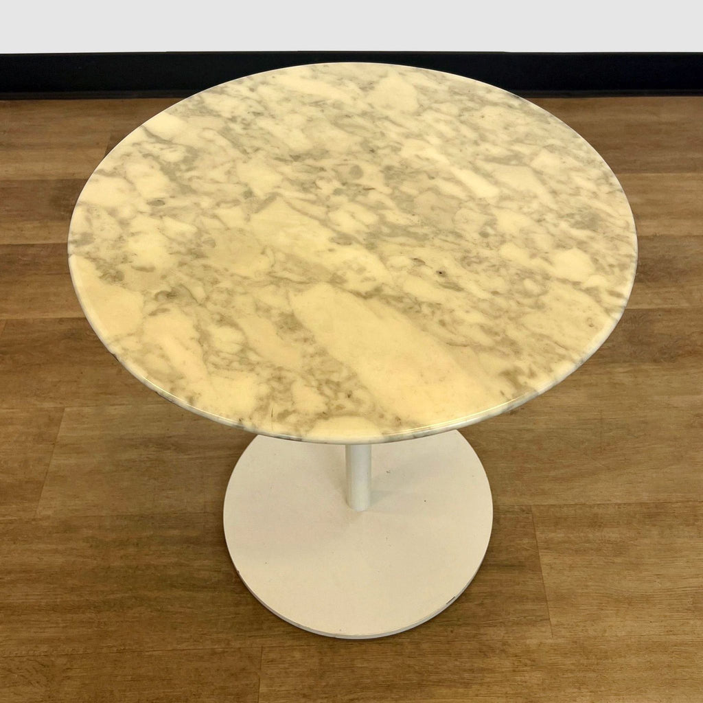 a vintage marble and marble round table