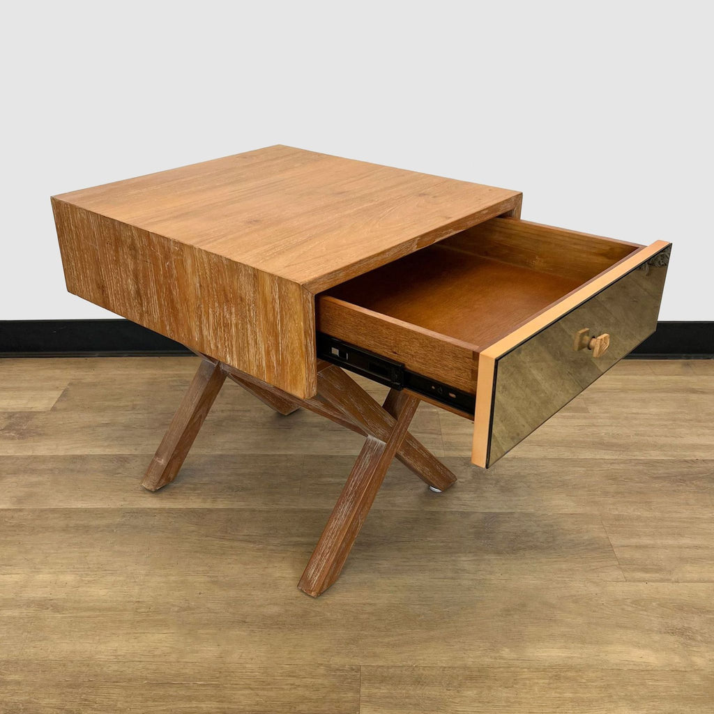 a mid century modern coffee table with a drawer and a drawer.