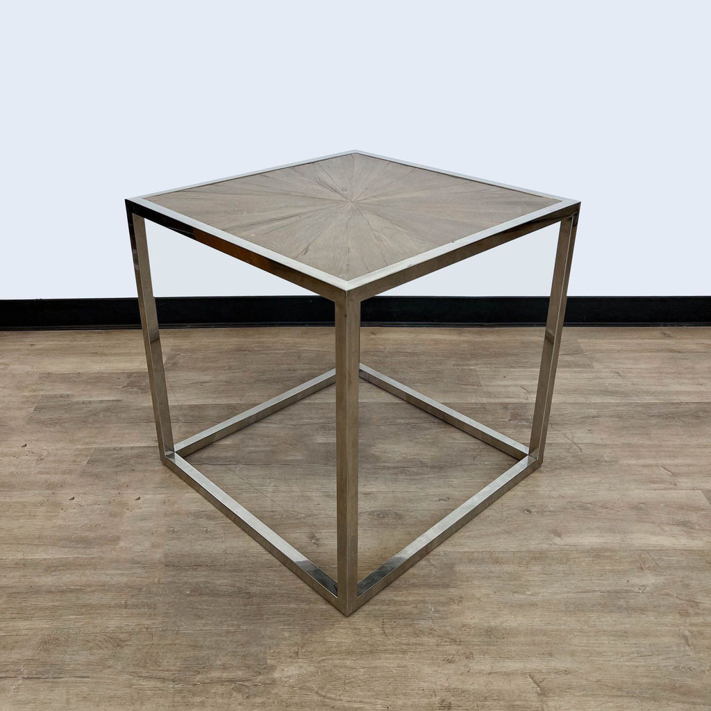 Contemporary Brownstone Furniture end table showing geometric wood design and sleek metal legs.
