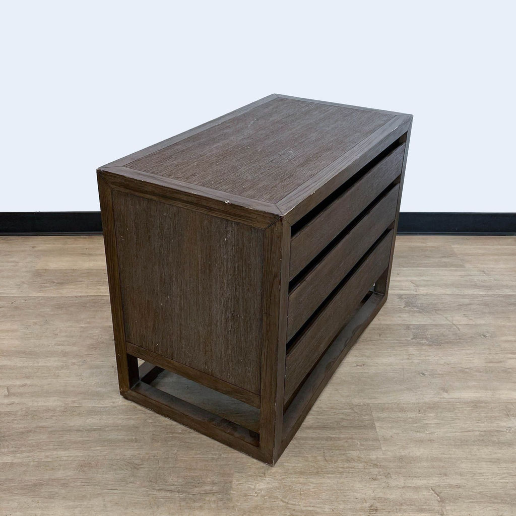 Side angle view of a closed Brownstone Furniture end table with a contemporary design.