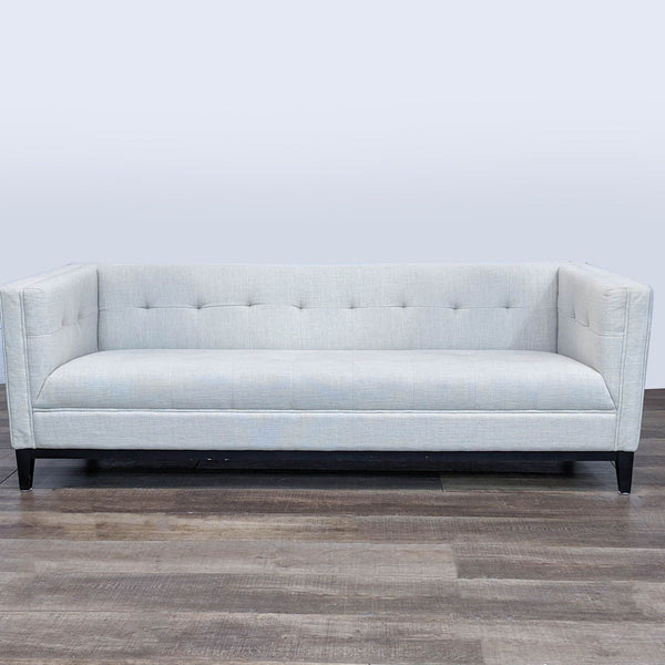 Gus* Modern Atwood Sofa in fabric with blind-tufted detailing and walnut finish wood base.