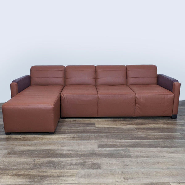 1. Reperch modern brown leather sectional with plush seating and sturdy legs, shown in a frontal view on a wooden floor.