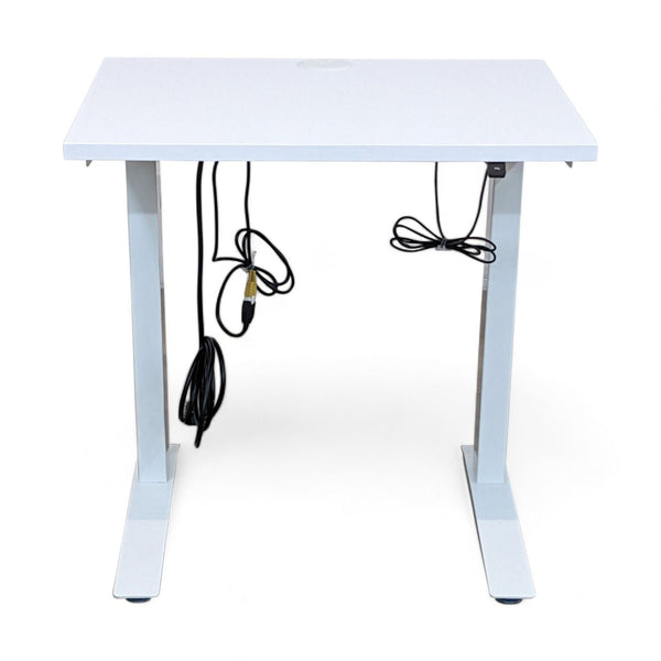 Alt text 1: White Fully brand standing desk with electric height adjustment mechanism visible beneath the tabletop.