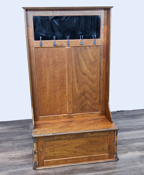 - Alt text 1: Front view of a Reperch wooden hall tree with bench storage and a row of metal hooks under a top mirror on a wood floor.