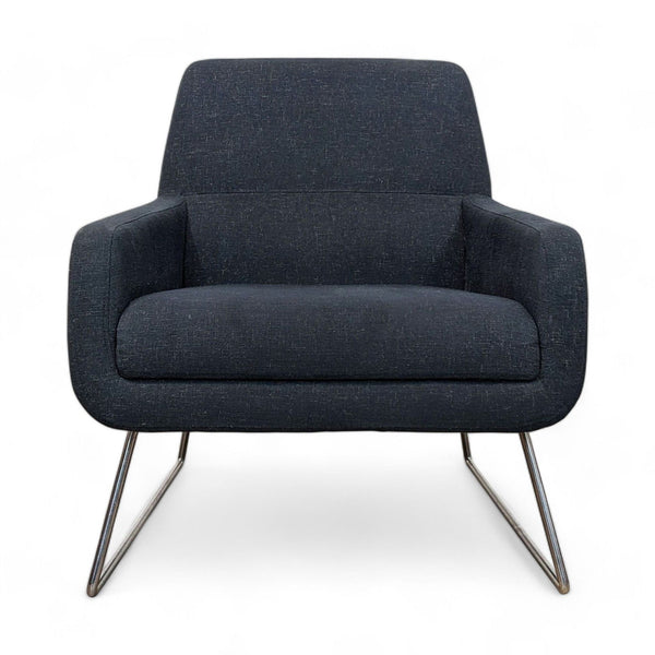 1. "Reperch lounge chair with a minimalistic design, featuring charcoal fabric and sleek metal legs, viewed from the front."