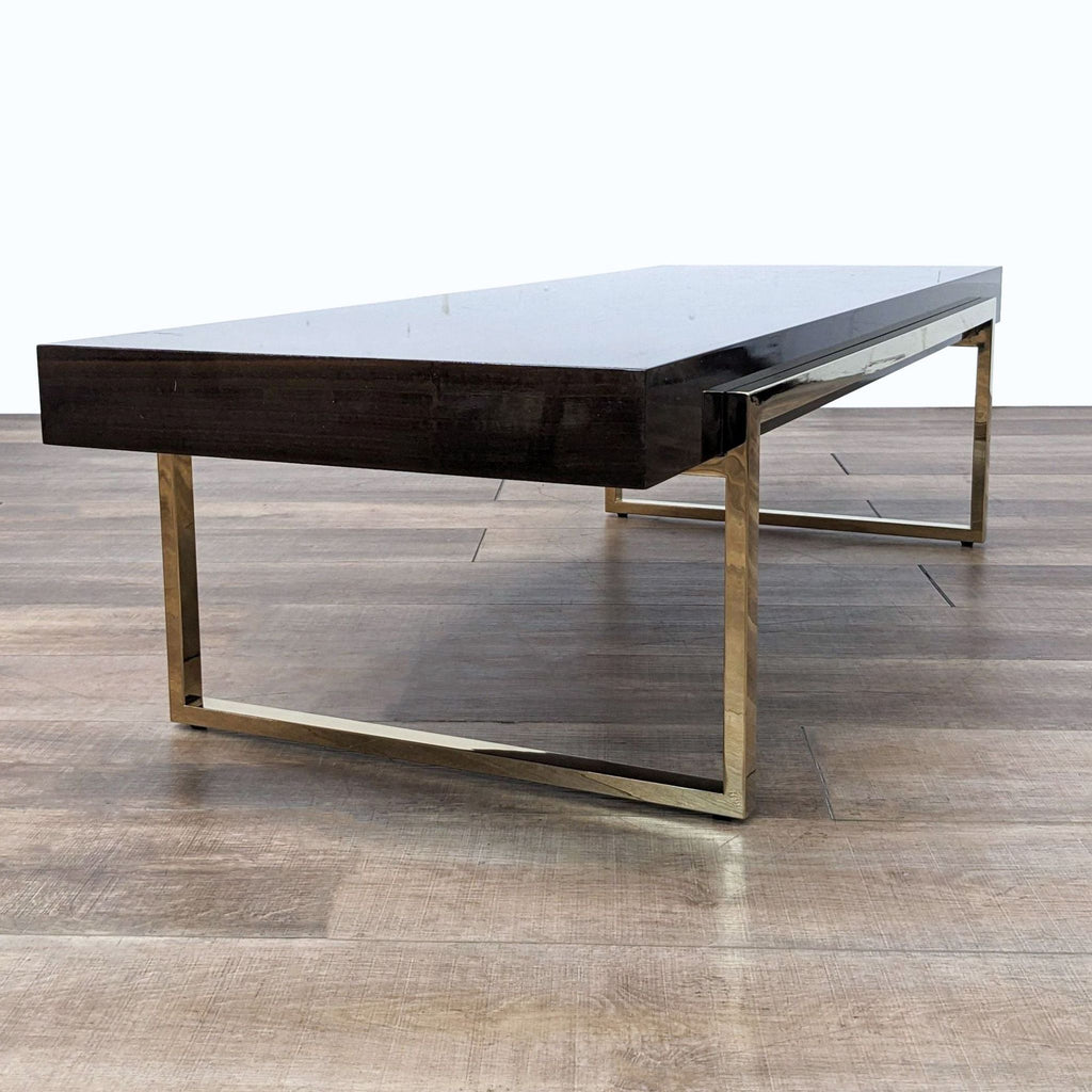 a coffee table with a black marble top.