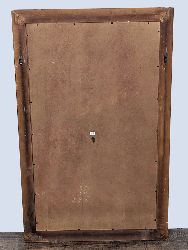 Rear view of Reperch vintage-style mirror showing the brown backboard and frame's brackets.