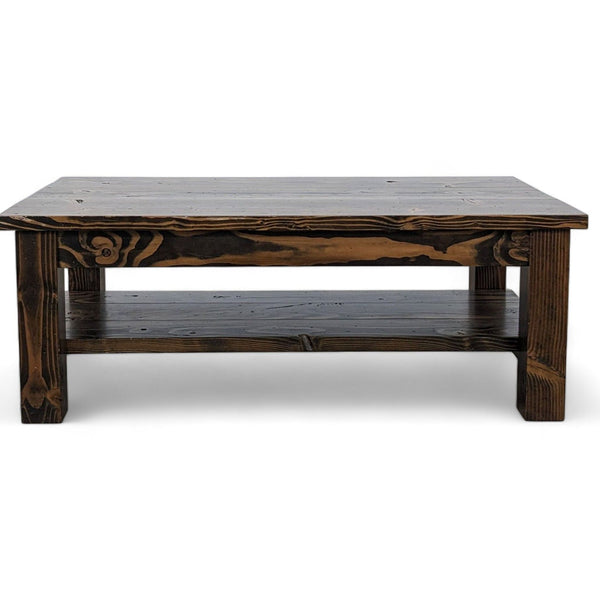 Emmor handcrafted wooden coffee table with rustic finish and lower shelf, isolated on a white background.