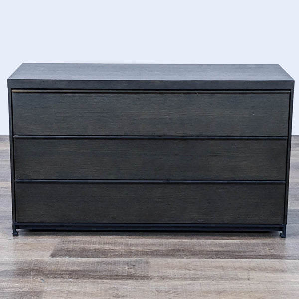 Reperch brand modern 3-drawer black dresser with simple design on wood floor.