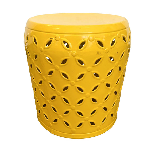 1. Bright yellow Reperch side table with intricate cut-out pattern, isolated on white background.