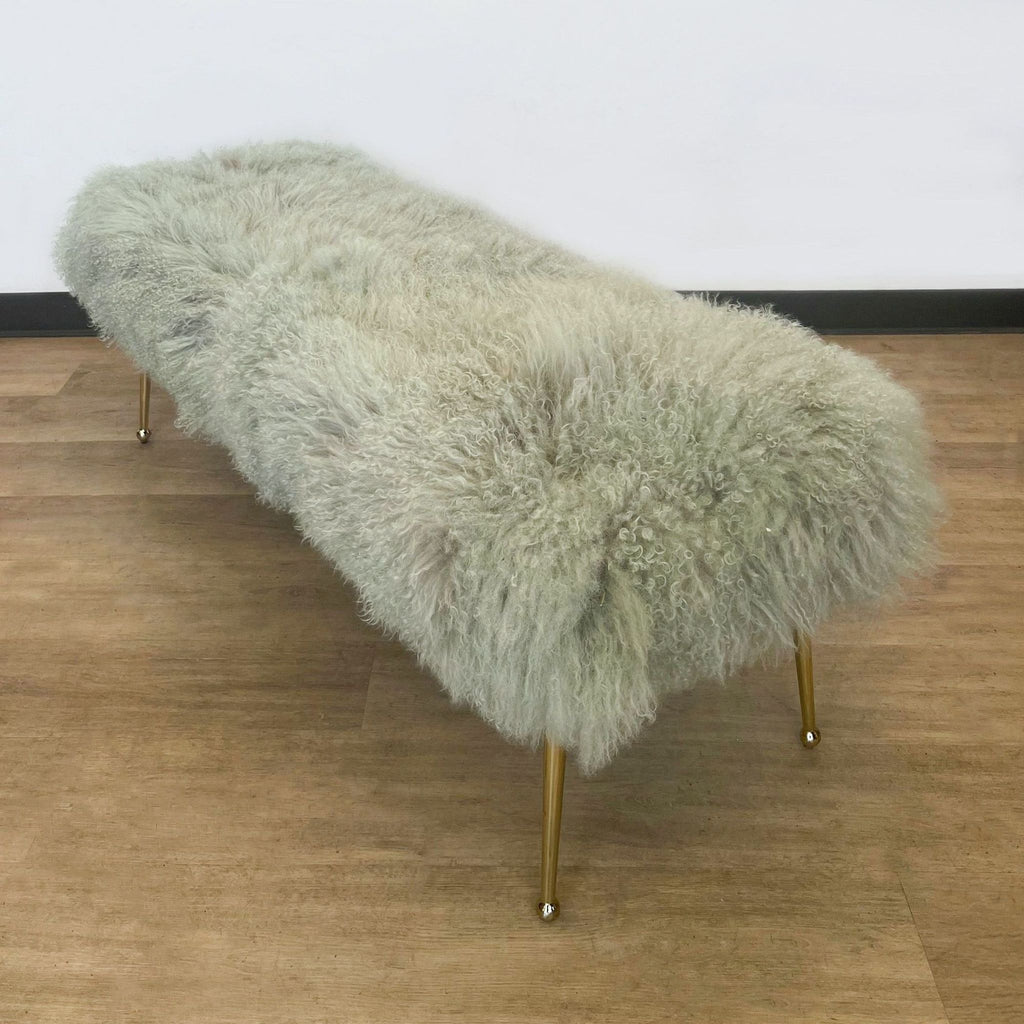 3. Elegant 48-inch gray shaggy bench by H.D. Buttercup, featuring a plush seat and metallic gold legs, staged in an indoor setting.