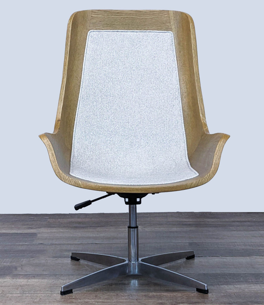 1. Front view of a Burbank Desk Chair by Four Hands, showing light sand upholstery and toasted ash bent-wood back on a steel base.