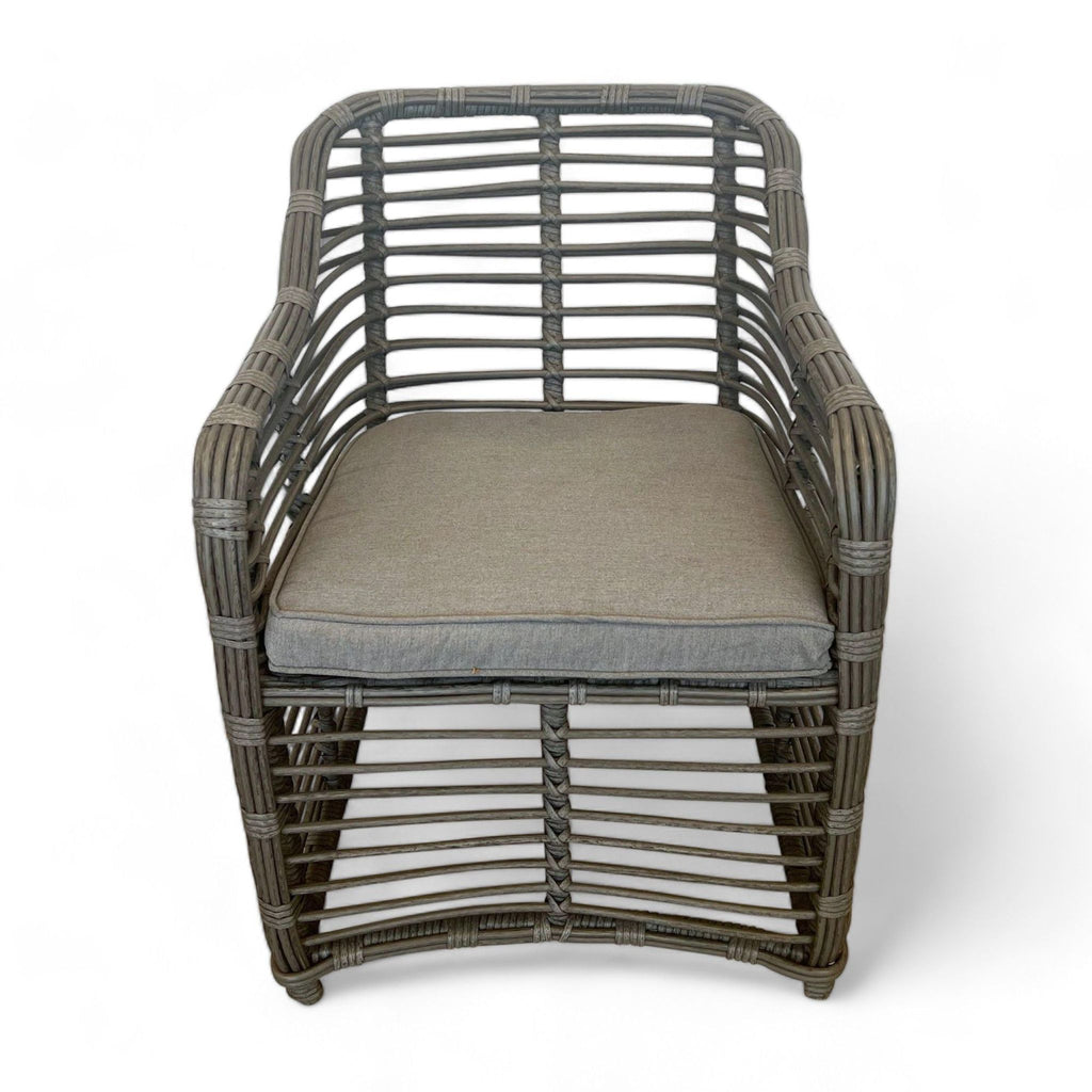 Front view of the Reperch woven bamboo chair featuring a cushioned seat.
