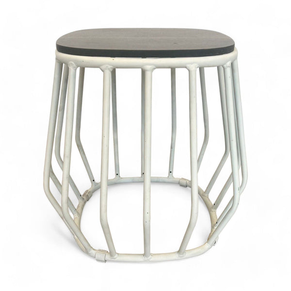 1. "Reperch brand side table with a white metal base and a round gray tabletop."