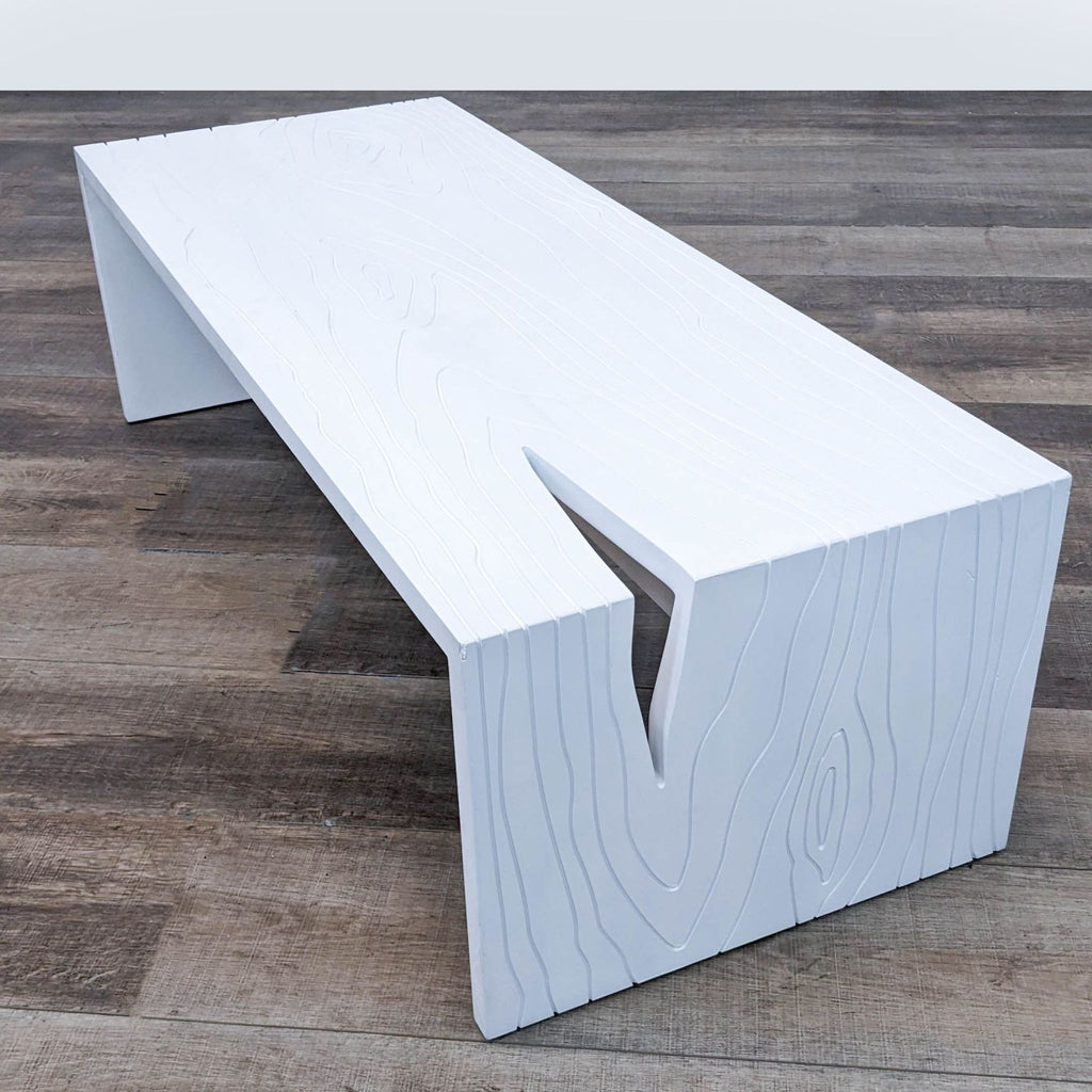 White, wood-textured coffee table by GUS Design at an angle, from H.D. Buttercup.