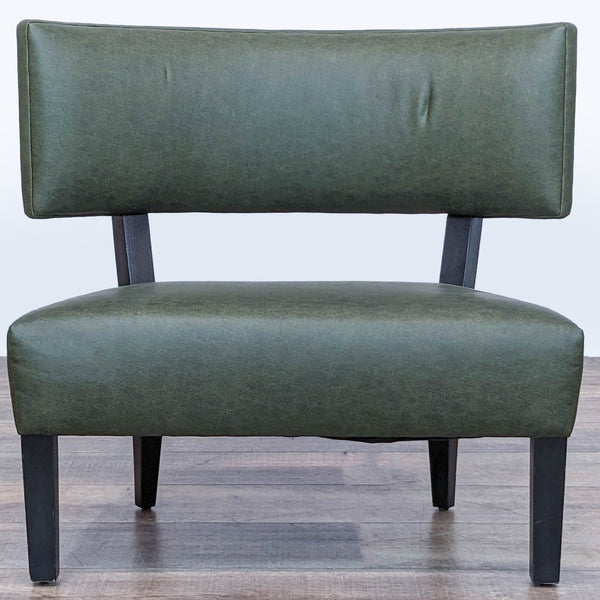 1. Reperch lounge chair with green faux leather and black tapered legs in a mid-century modern style.