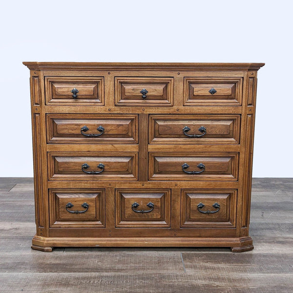 1. Front view of a Thomasville traditional wooden dresser with 10 beveled framed drawers and antique hardware on a plain background.