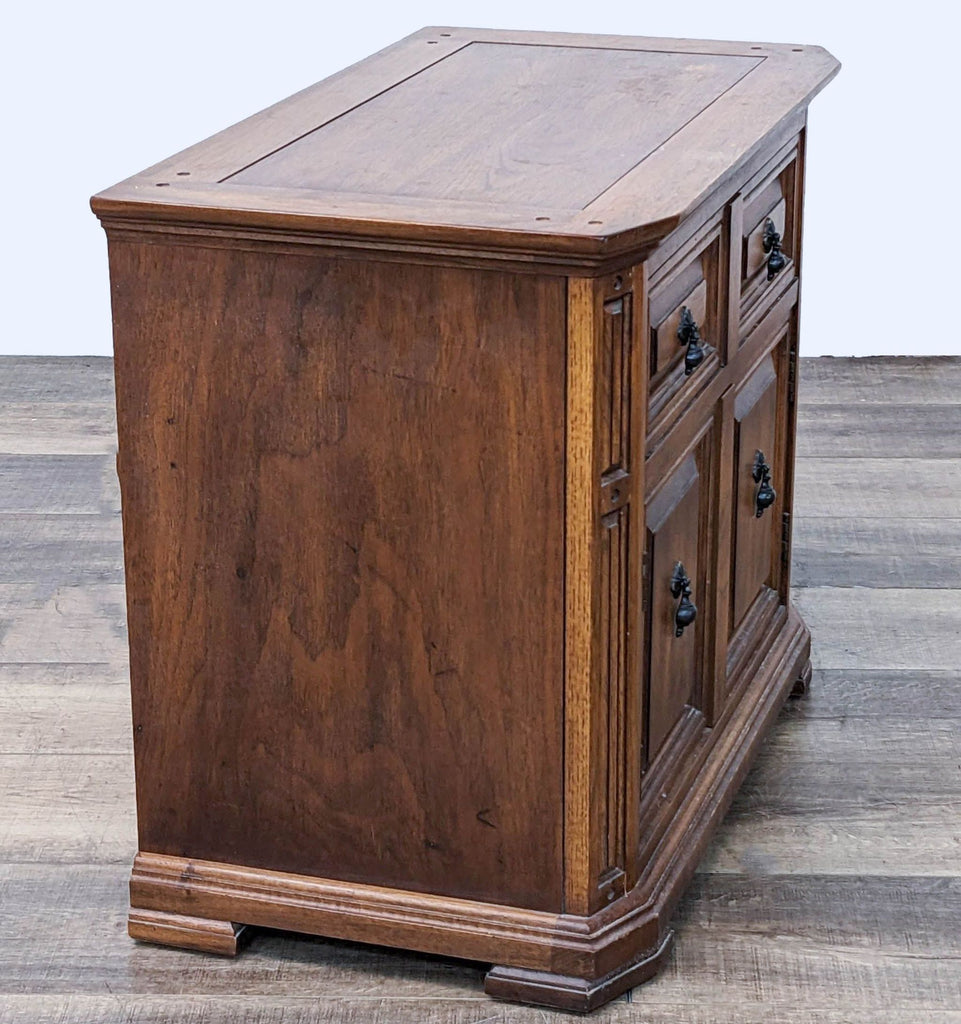 Side view of a Thomasville cabinet highlighting its wooden texture and metal handles.