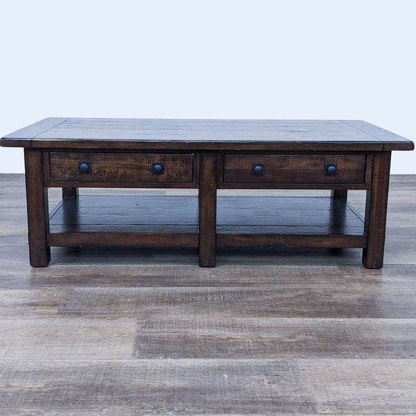 Alt text 1: Pottery Barn solid wood coffee table with two drawers and a lower shelf, showing hand-applied finish and metal hardware.