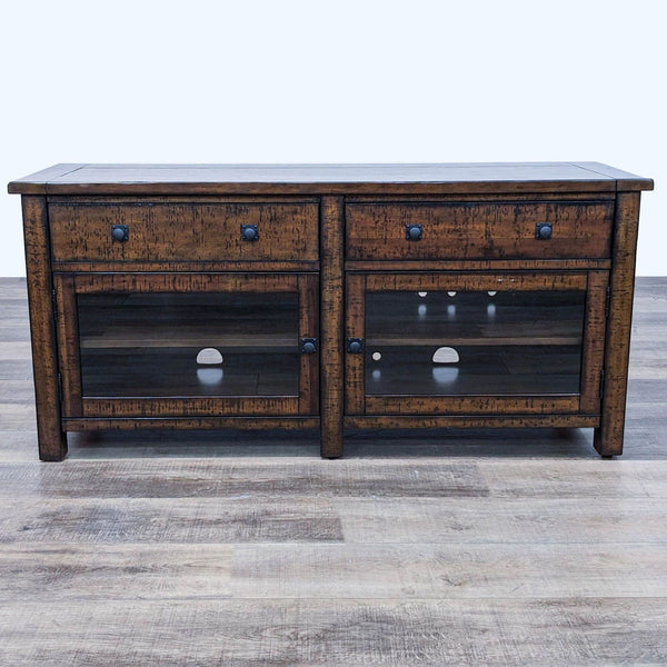 Pottery Barn media console with solid wood drawers and glass doors, showcasing saw marks and natural grain.