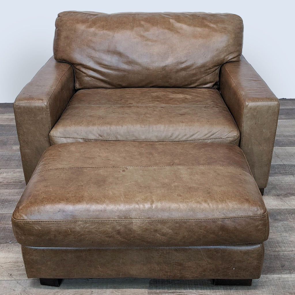 Jeromes Leather Lounge Chair with Matching Ottoman