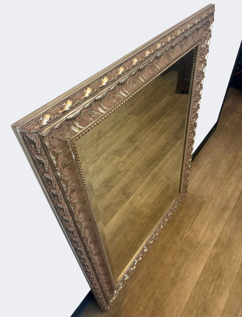 a large antique french gilt mirror