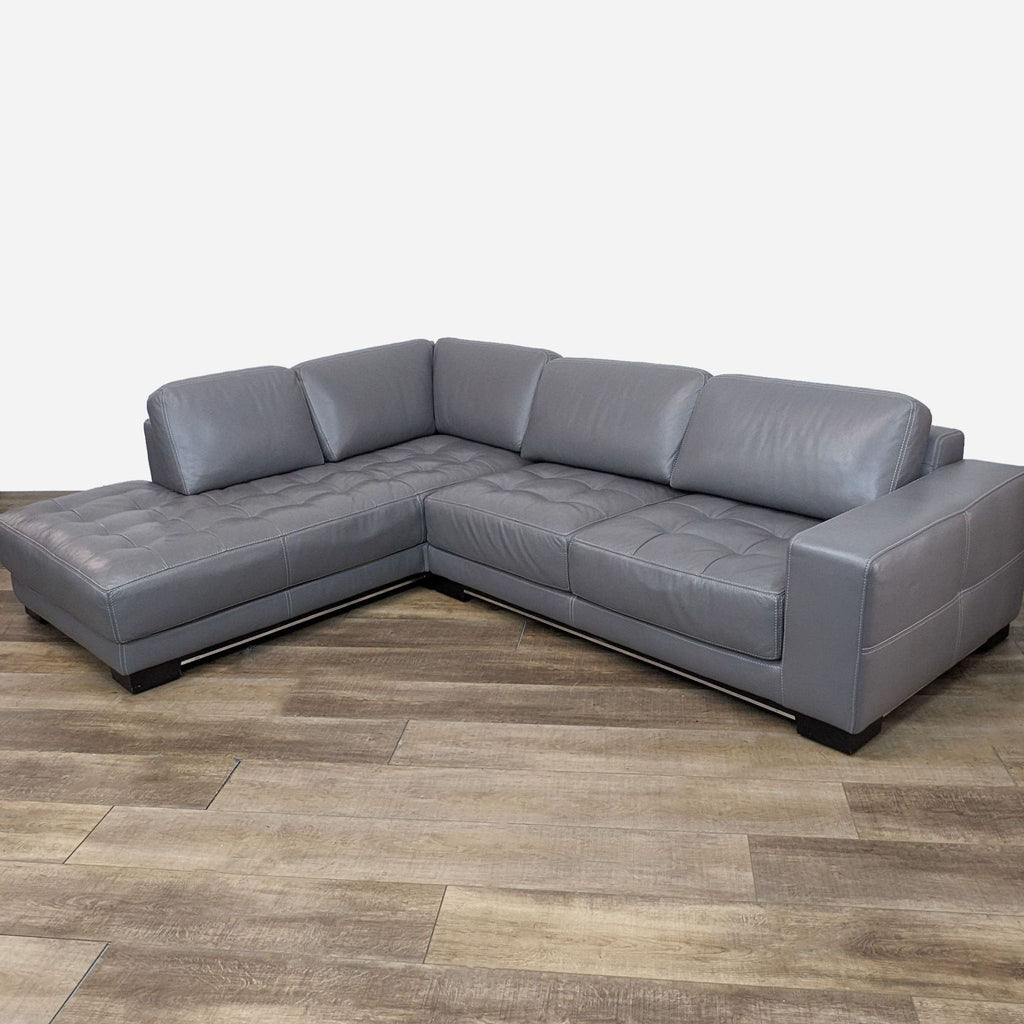 sectional sofa in grey leather with a square shape