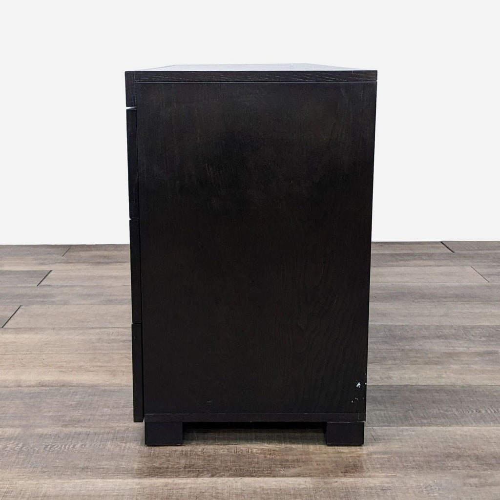 the black sideboard with a black finish