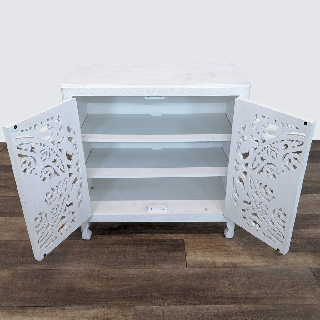 white painted wood storage chest with a white painted finish