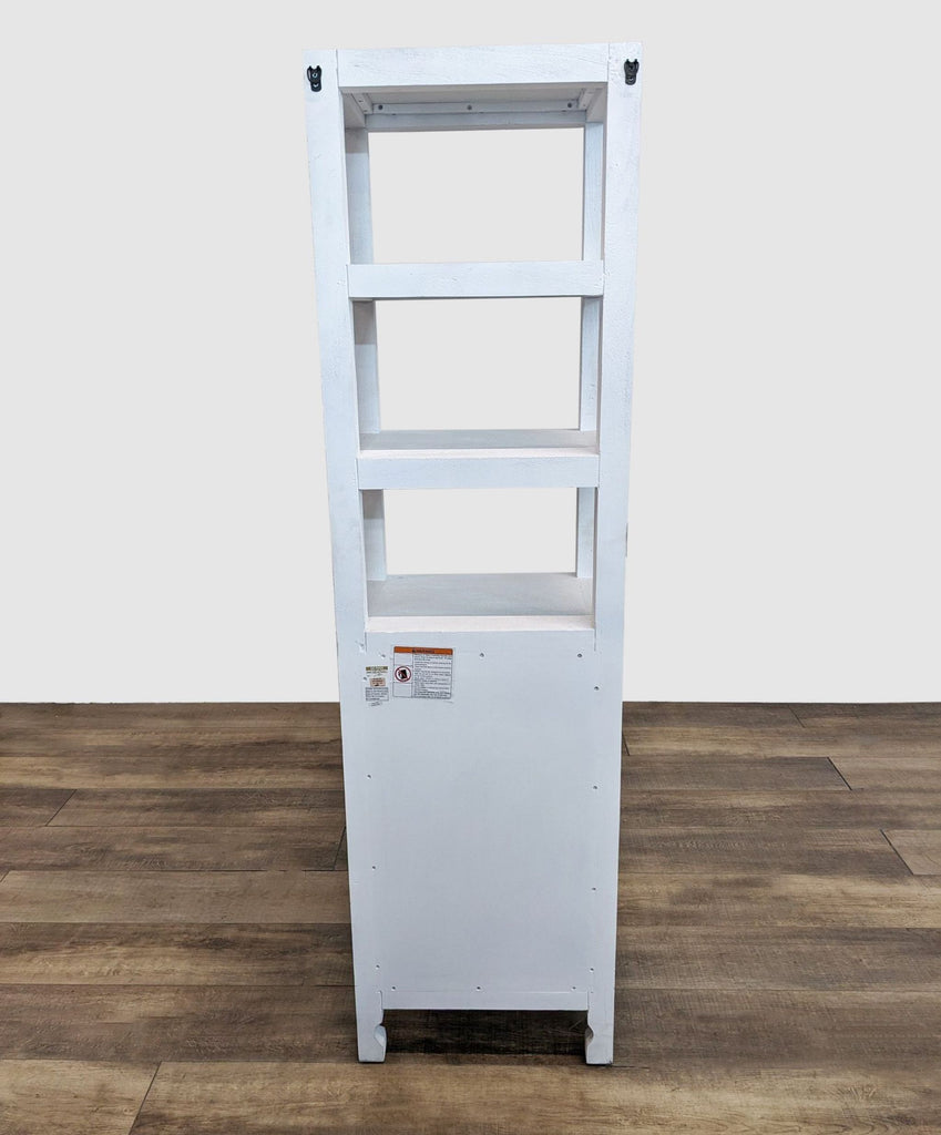Back view of white hardwood bookshelf, minimalist design.
